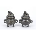 Pair of Koro/Censer, Japan 19th/20th century, bronze. Bellied body with relief decoration (
