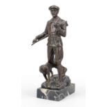 Rudolf Bröse (1865-1944), Hunter with dog on the prowl, bronze, brown patina over marble plinth,