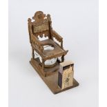 Joker match holder with ashtray, late 19th century, wood and porcelain. Commode chair with porcelain