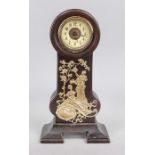 Art Nouveau mahogany table clock with gilded ornamentation typical of the period, varnished paper