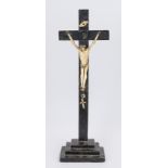 Crucifix, 18th century, wood and bone. Square, stepped pedestal with Christ on the cross, carved