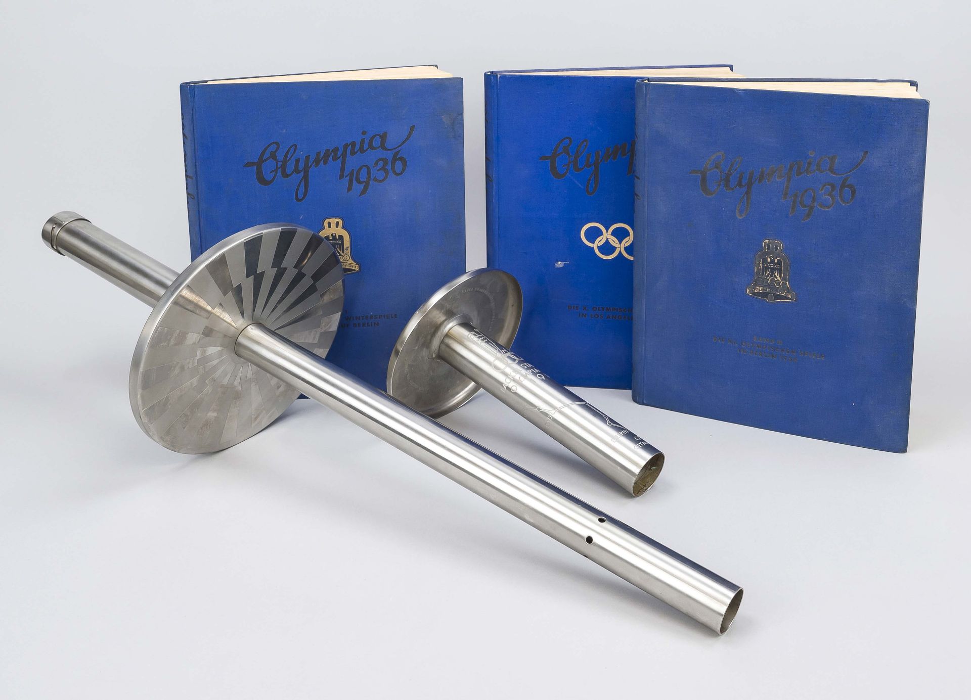 Mixed lot of 2 Olympic torches, probably late 20th century, stainless steel. Torch ''Games of the XX