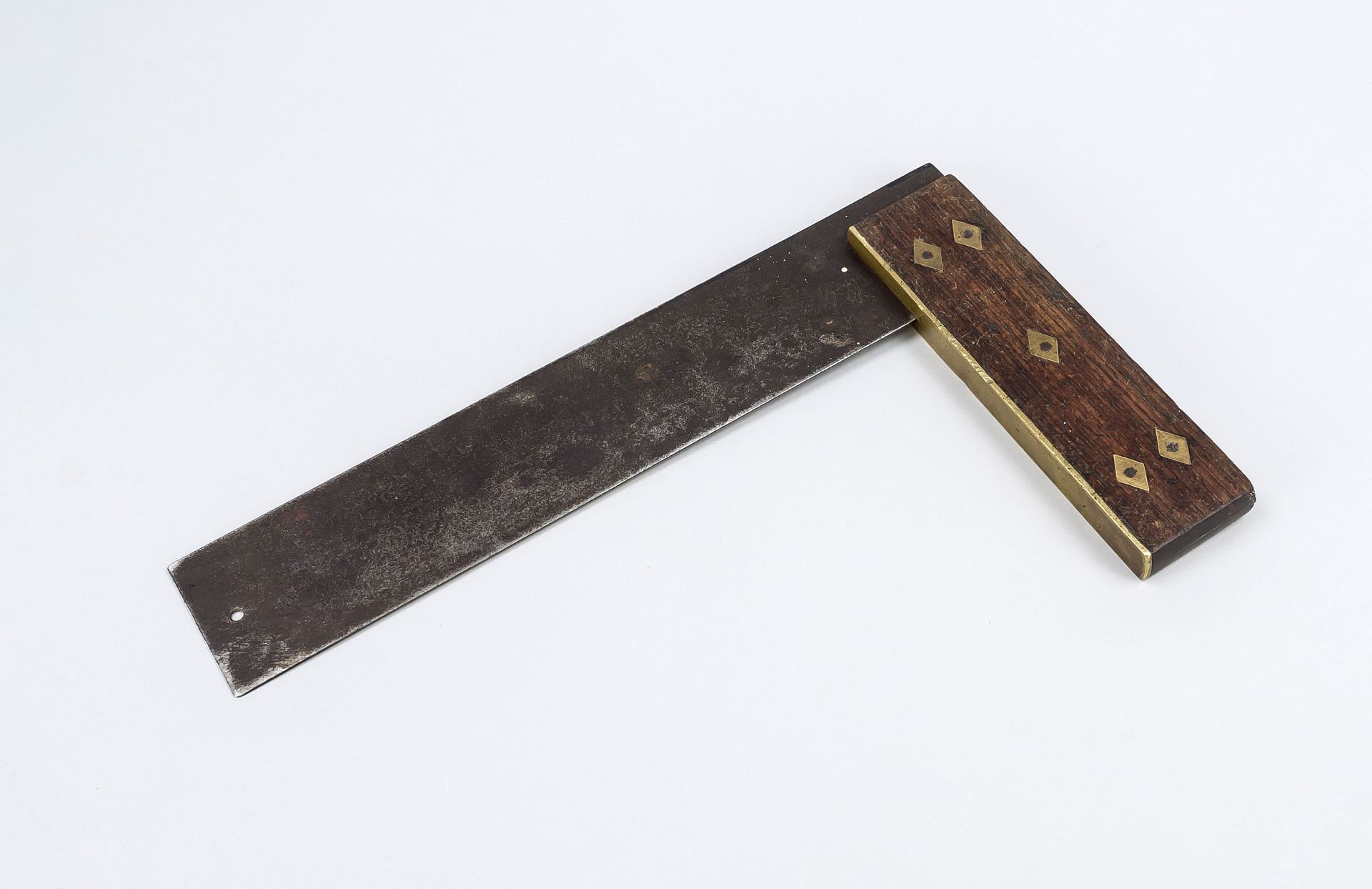 English protractor around 1900, walnut with brass inlays in diamond shape, signed P.G. Clarke, l. 36