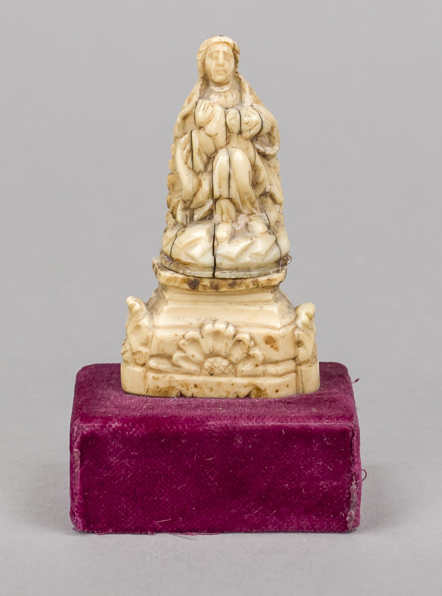 Small Madonna made of mammoth ivory, probably 18th century, probably fragment of a larger object.