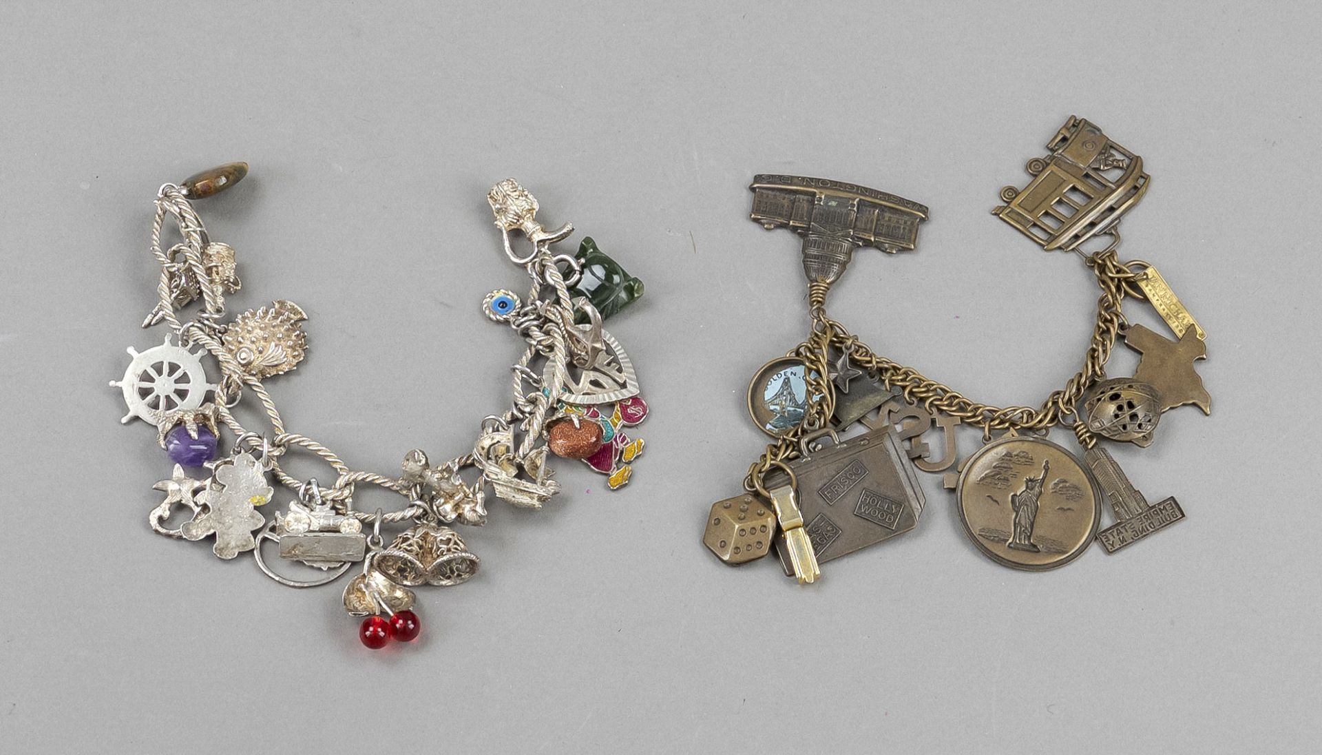 Two vintage costume jewelry charm bracelets, silver and bronze-coloured metal, various pendants, one