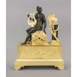 Empire Bronze Figures Pendulum, firegilt, 1st half 19th century, warrior with lyre on clock drum, on