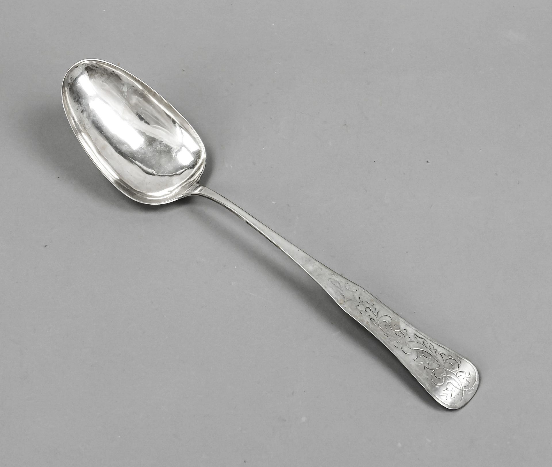 A large dumpling spoon, 19th century, maker's mark P.A.J., probably under-alloyed silver, oval bowl,