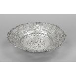 Round openwork bowl, German, 20th century, silver 800/000, on 4 feet, curved rim, wide rim richly