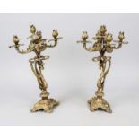 Pair of girandoles, 20th century, brass. Ornamented base, dragon shaft, each with 5 flames, rubbed &