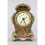 small table clock/alarm clock Boulle-style, probably France, around 1900, wooden body with brass