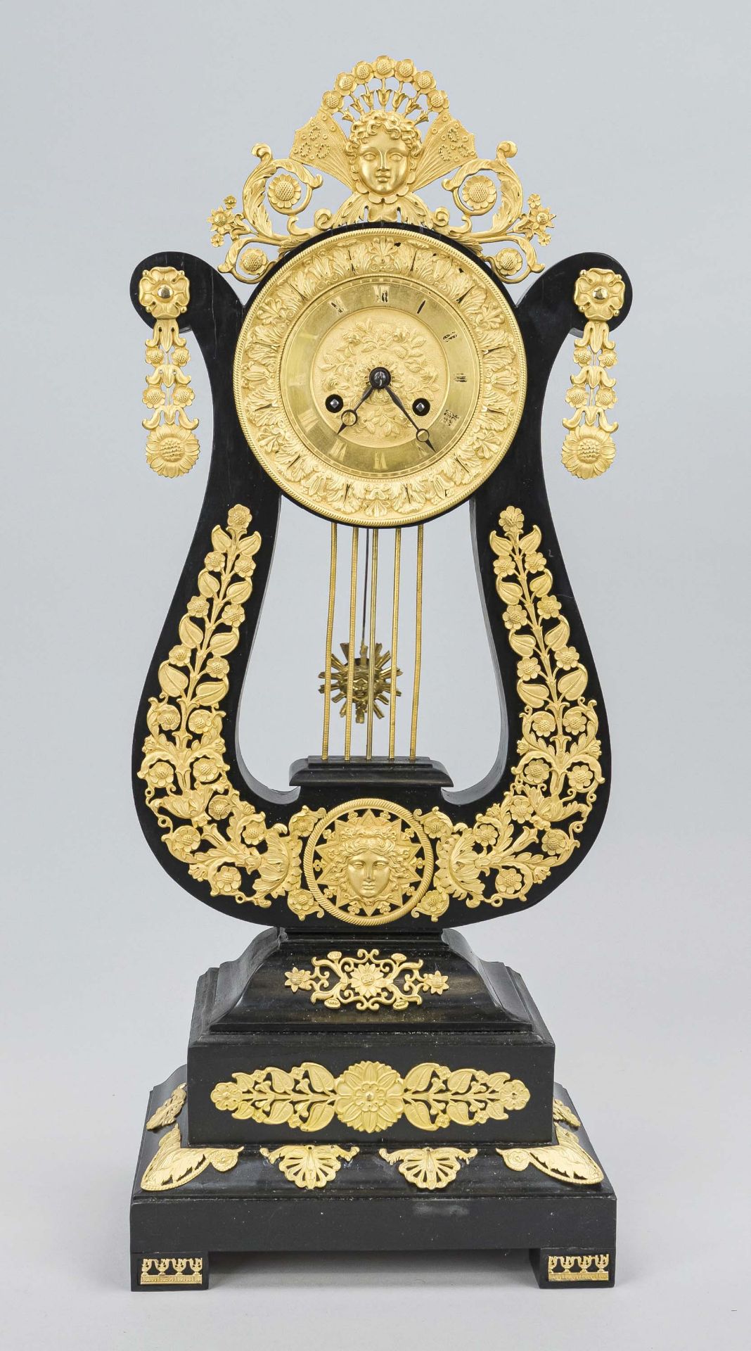 Lyre pendulum, 1st half 19th century, ebonized wood, gilded bronze applications, polished and