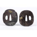 2 iron tsuba, Japan Edo period, iron. Each decorated with butterflies in relief on both sides,