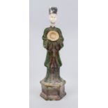 Court official, China, probably Ming dynasty. Standing in a wide-cut robe on a hexagonal pedestal.