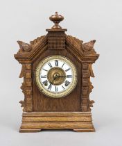 American oak table clock, c. 1870, architectural design with carved and turned decoration, white