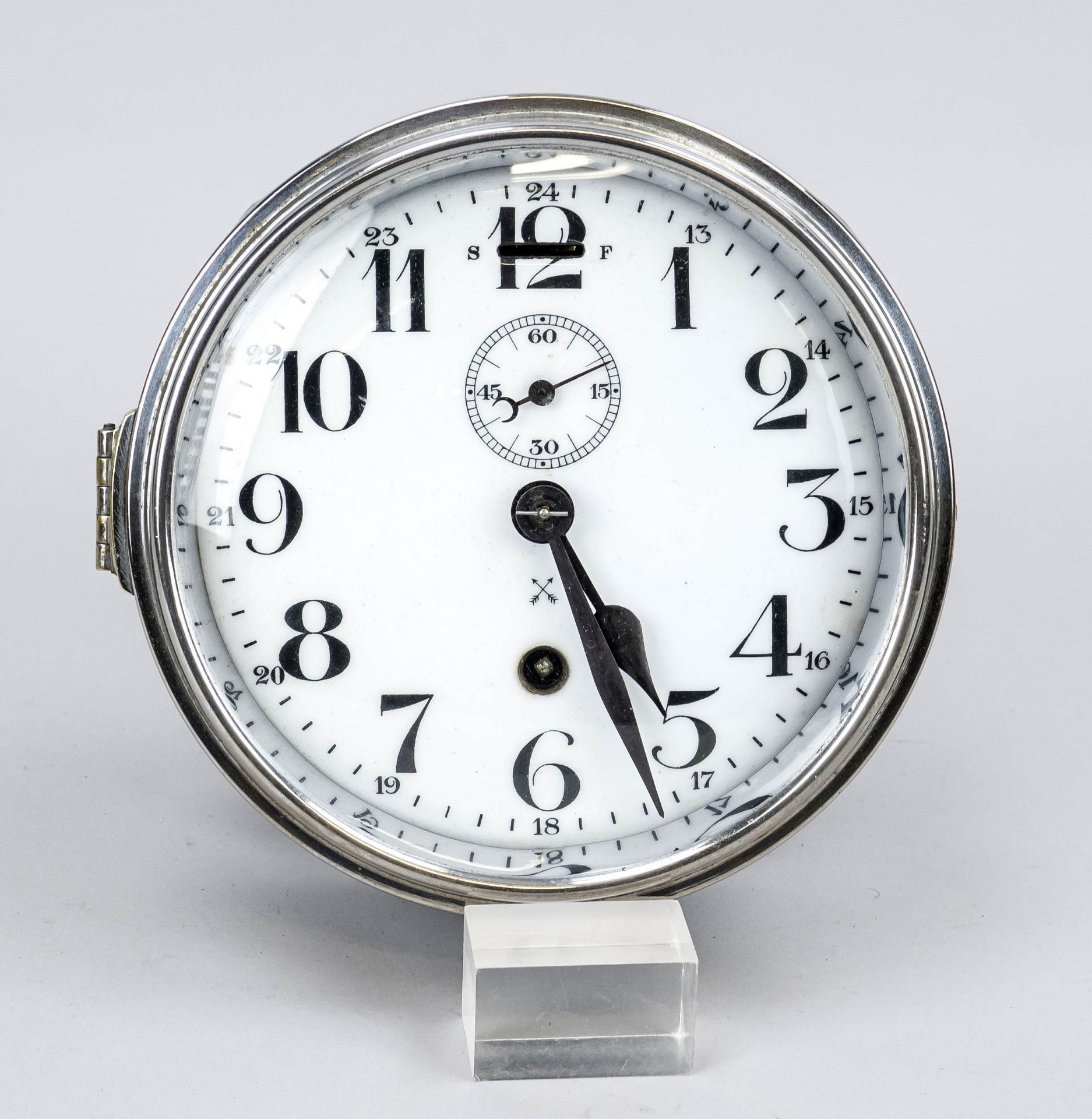 Wall clock chrome-plated with white enamel dial with black arab. numerals and blackened hands,