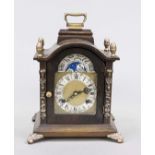 Table clock, 20th century, walnut, florally engraved brass dial with applied silver-filled chapter