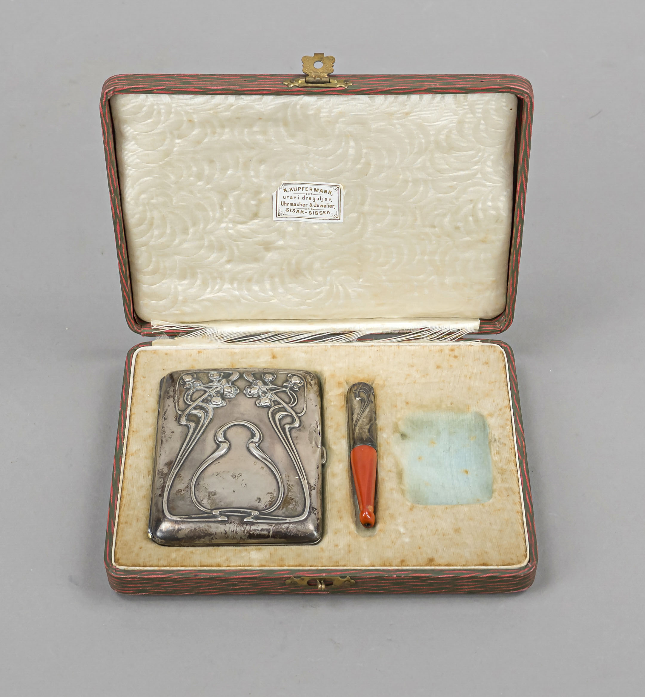 Two parts of an Art Nouveau smoking set, German, c. 1900, silver 800/000, cigarette case and holder,