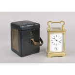 French. Travel alarm clock, circa 1920, solid brass gilt, set off with rose gold border, faceted