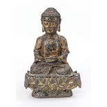 Buddha on lotus base, China 17th century (Ming dynasty), bronze with partial lacquer and residual