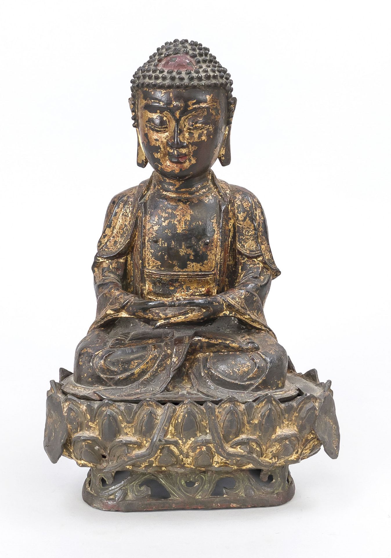 Buddha on lotus base, China 17th century (Ming dynasty), bronze with partial lacquer and residual