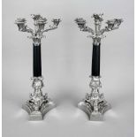 A pair of large six-flame candlesticks, 20th century, plated, on 3 feet on a 3-pass stand, bud-