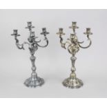 A pair of four-flame table candlesticks, 20th century, plated, round curved and domed stand,