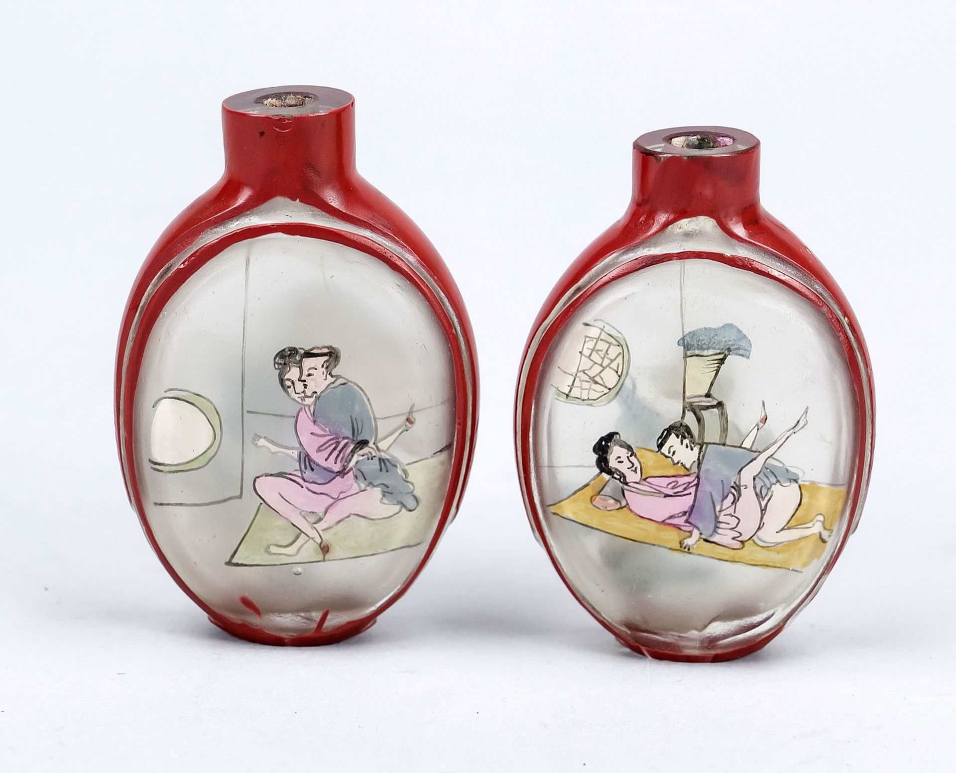 2 erotic snuffbottles, China Republic period. Reverse glass painting and red overlaid glass. Spoon