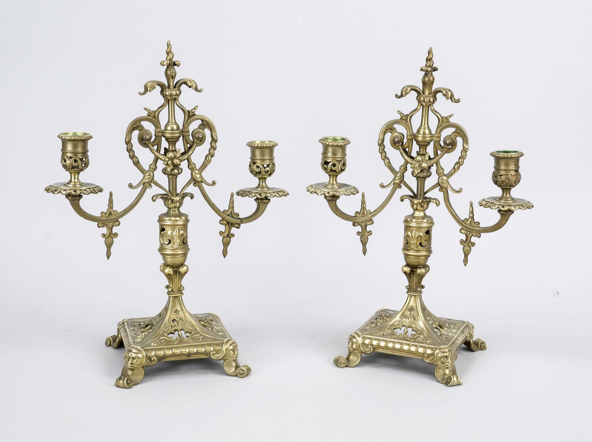 Pair of historicist candlesticks, c. 1880, bronze, openwork base, h. 34 cm