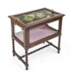 Tea cabinet, c. 1900, oak, glazed body on all sides with hinged door, removable tray, floral
