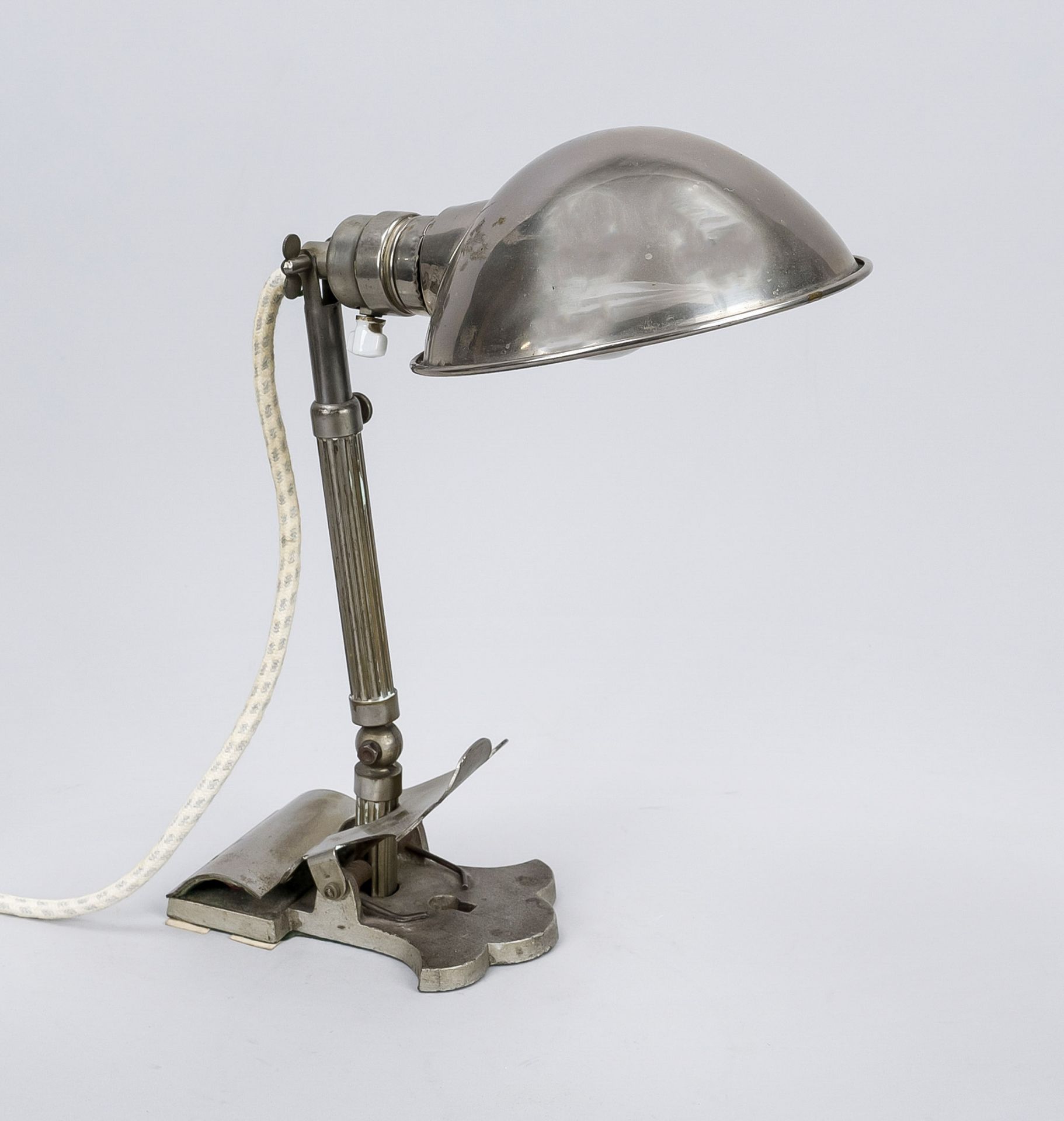 Desk lamp, early 20th century, brass and iron, partly chrome-plated. Heavy iron base with