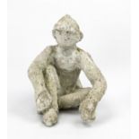 Johannes Brus (*1942), seated sculptor, 2012, concrete cast, h. 37 cm