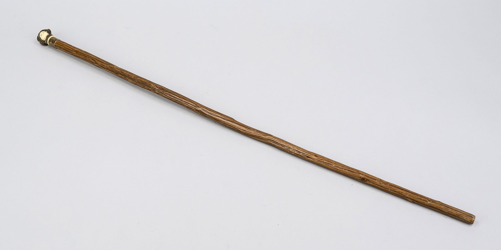 Walking stick with figural pommel, probably late 19th century, slender, natural shaft of dark - Image 2 of 2