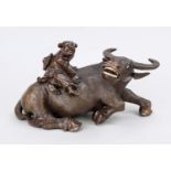 Water buffalo with rider, China, 1st half 20th century, fine carving of dark hardwood with bone