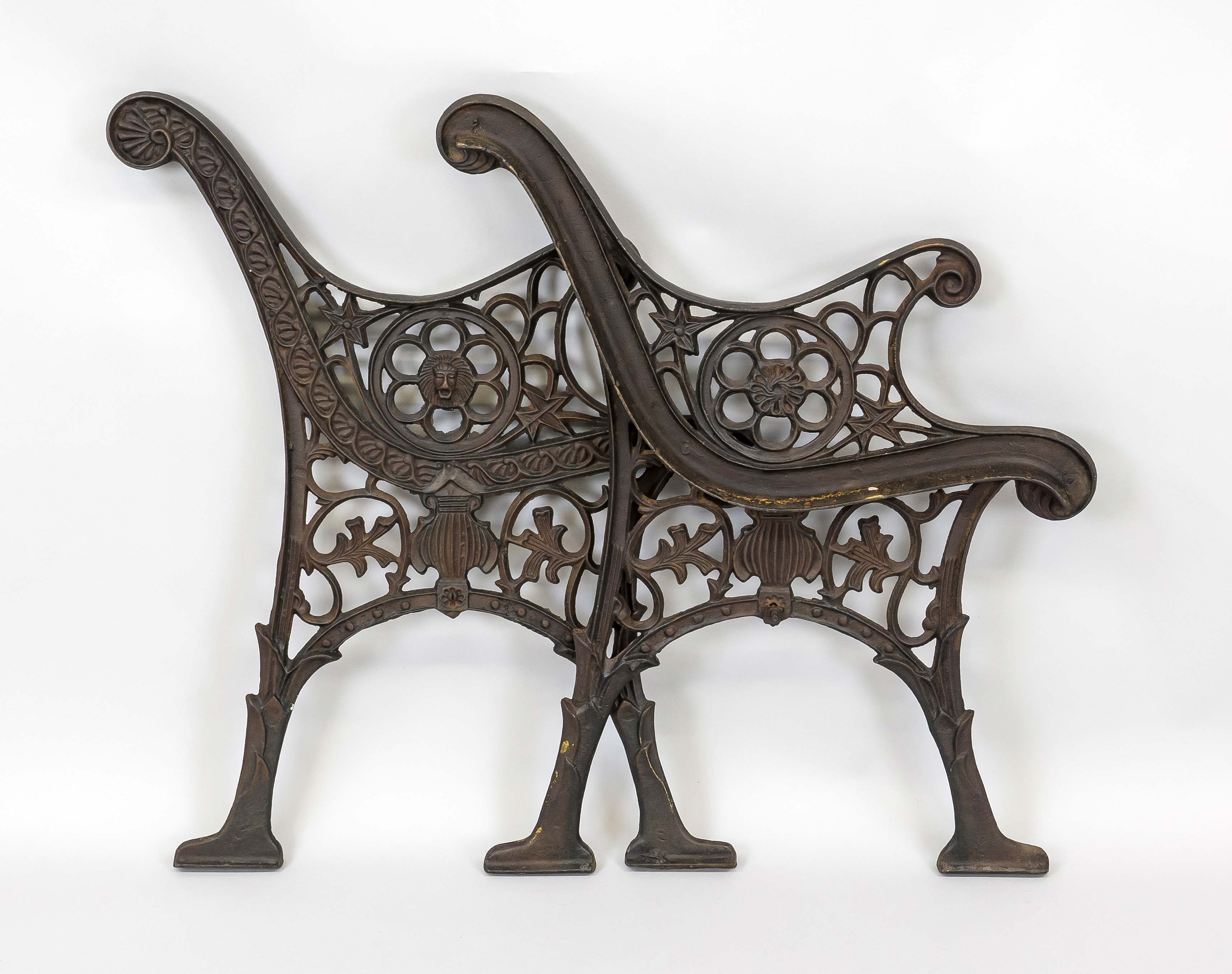 Frame for a garden bench, 20th century, cast iron, painted black, cheeks ornamentally pierced with