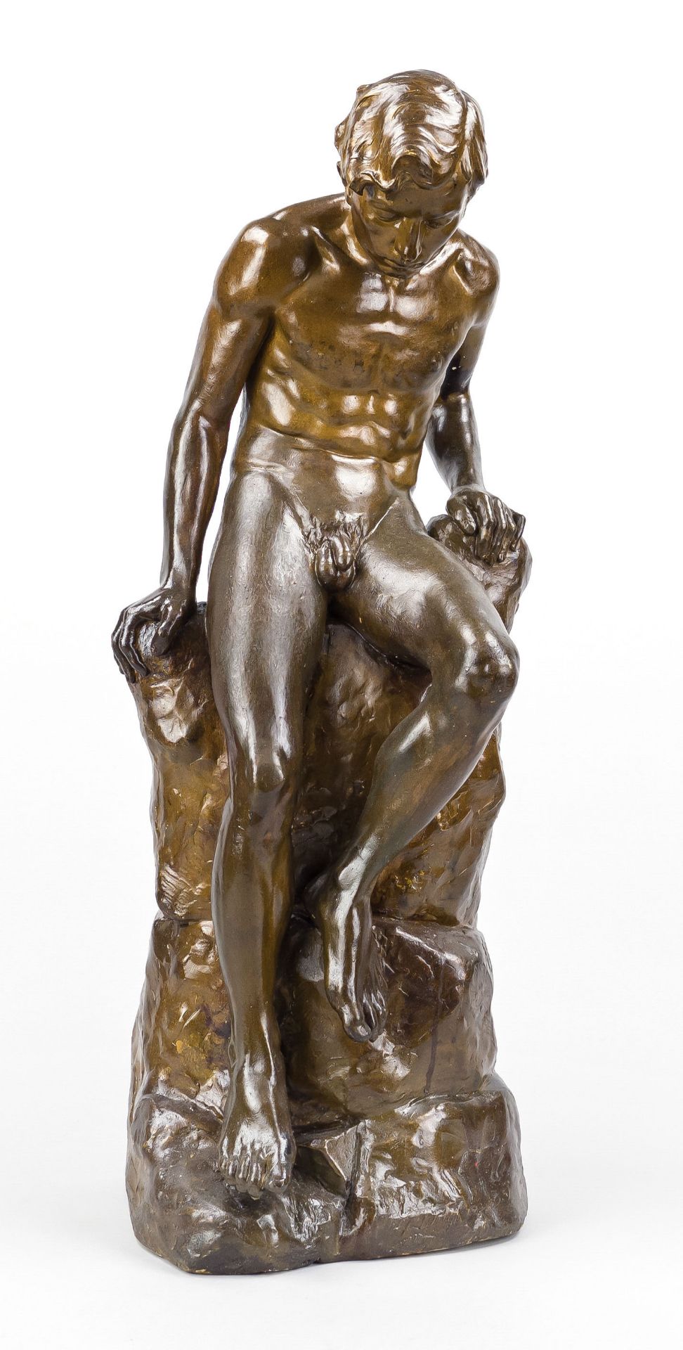 signed Ailez, sculptor c. 1900, sculpture of a naked young man sitting on a rock, brown painted