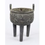 Tripod censer in archaic style, China, bronze. Round vessel with surrounding taotie relief