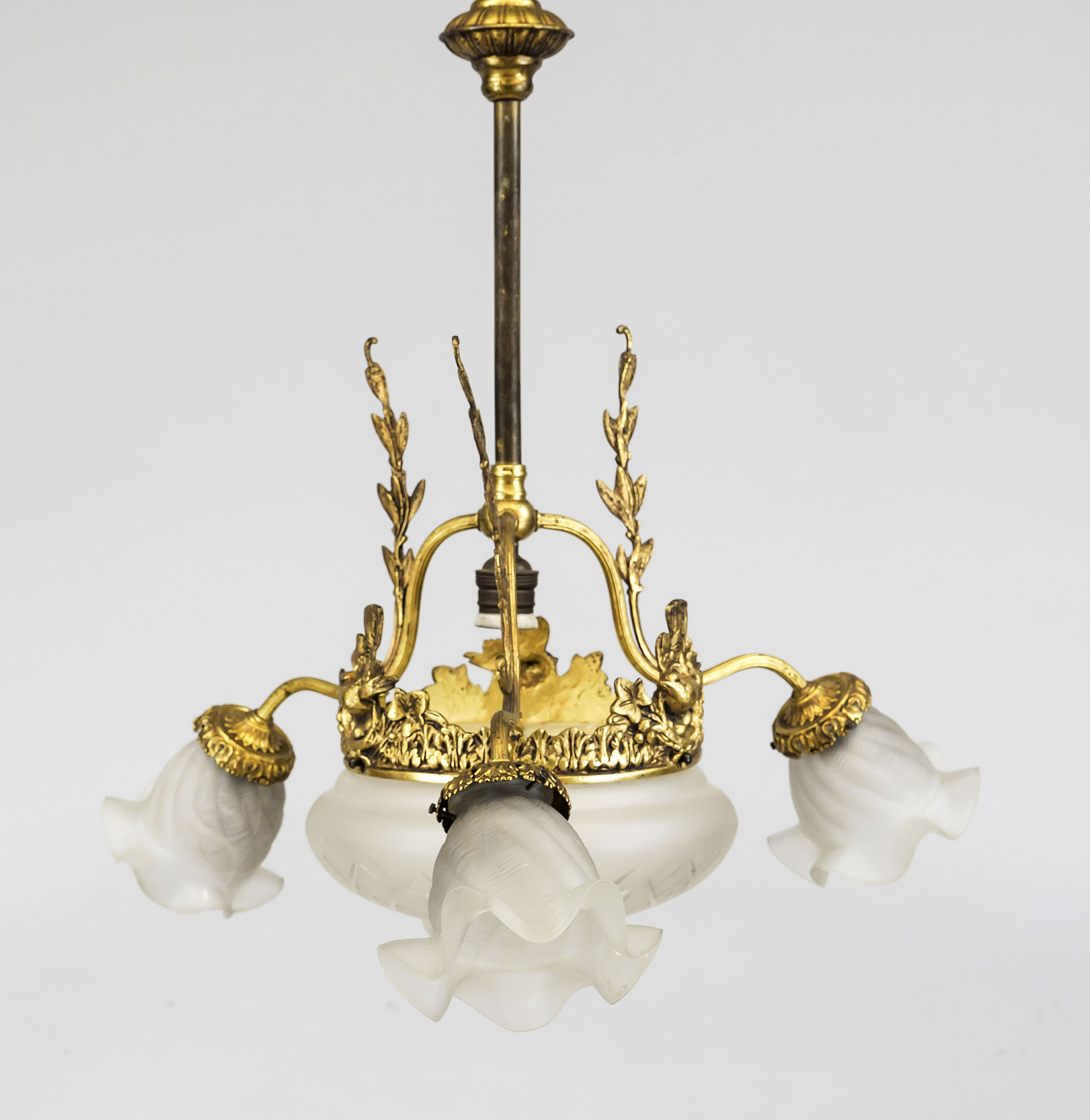 Ceiling lamp, late 19th century Ornamented brass wreath on 3 curved stems on a long shaft with