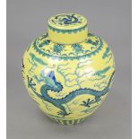 Yellow-ground lidded pot with dragon, China probably late Qing. Decorated all around and on the