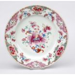 Famille Rose plate, China, 18th century (Qing/Yongzheng). Mirror with flower arrangement, rim with
