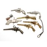 7 antique pocket watch keys, weapons, including the smallest pistol in the world with ammunition