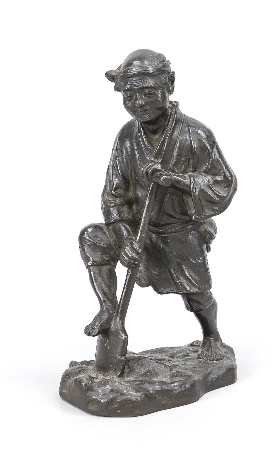 Farmer with spade, China, probably Republic period, bronze. On a terrain plinth. Signed/marked in