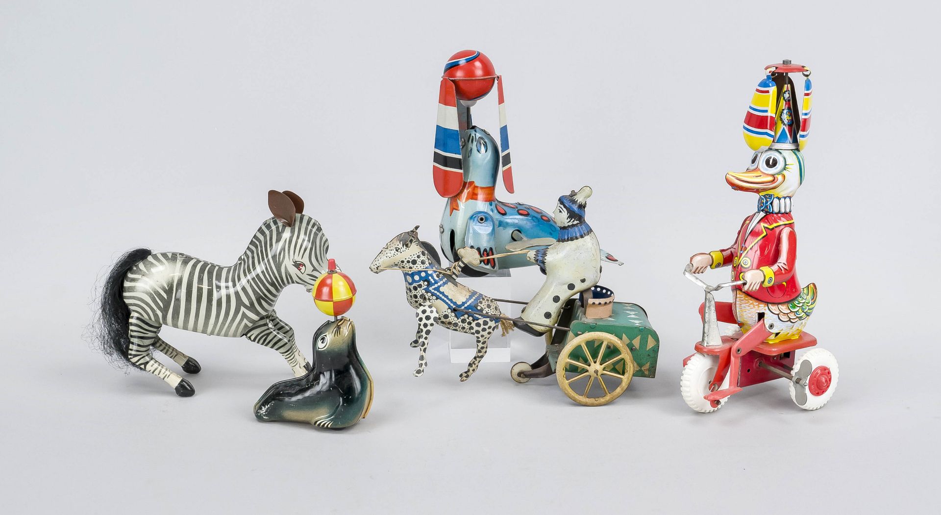 5 x tin toys with winding mechanism, 20th century, color painted tin, h. up to 22 cm