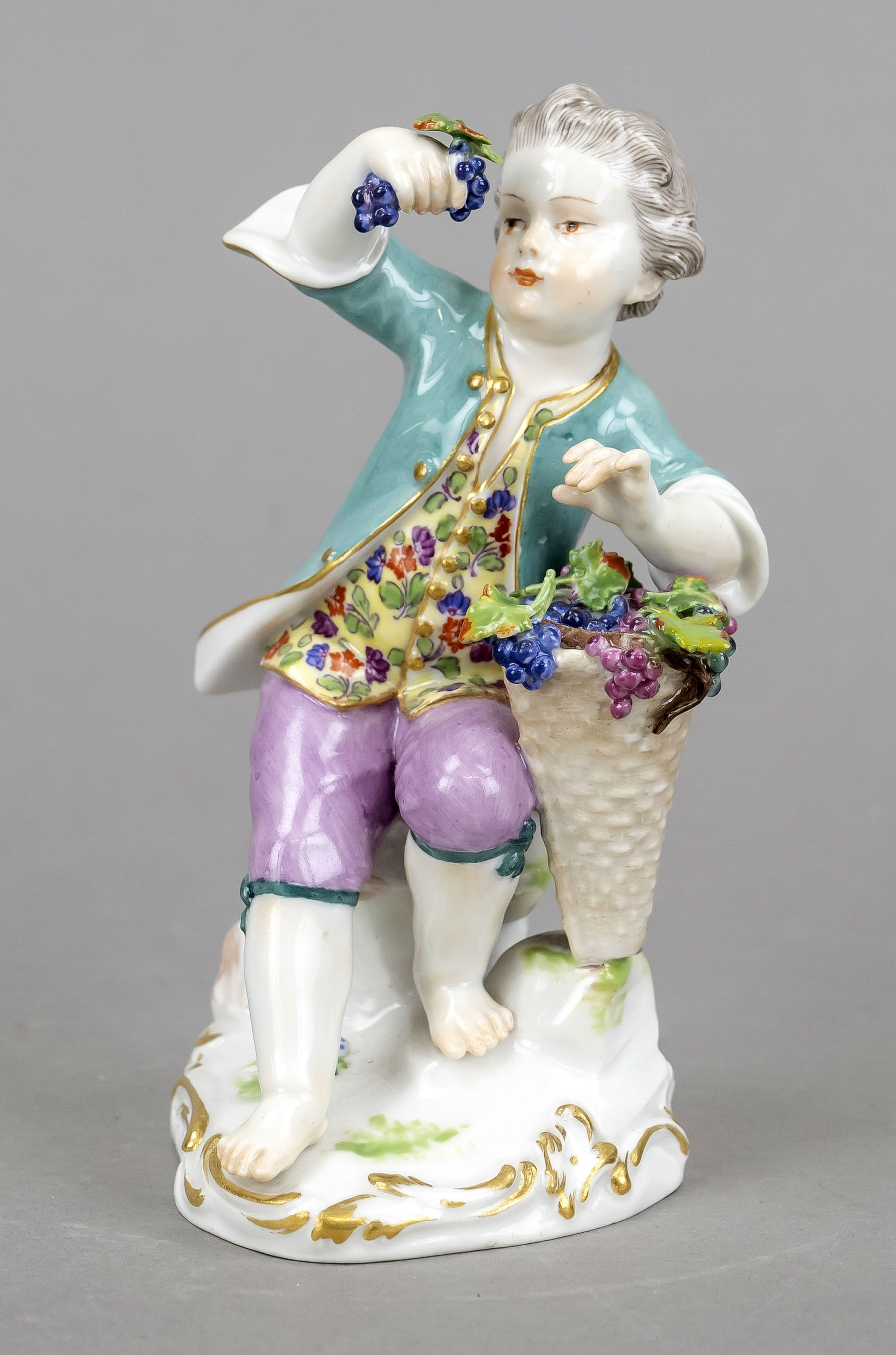 A gardener's boy with a wine box, Meissen, mark 1924-1934, 1st choice, designed by Johann Joachim