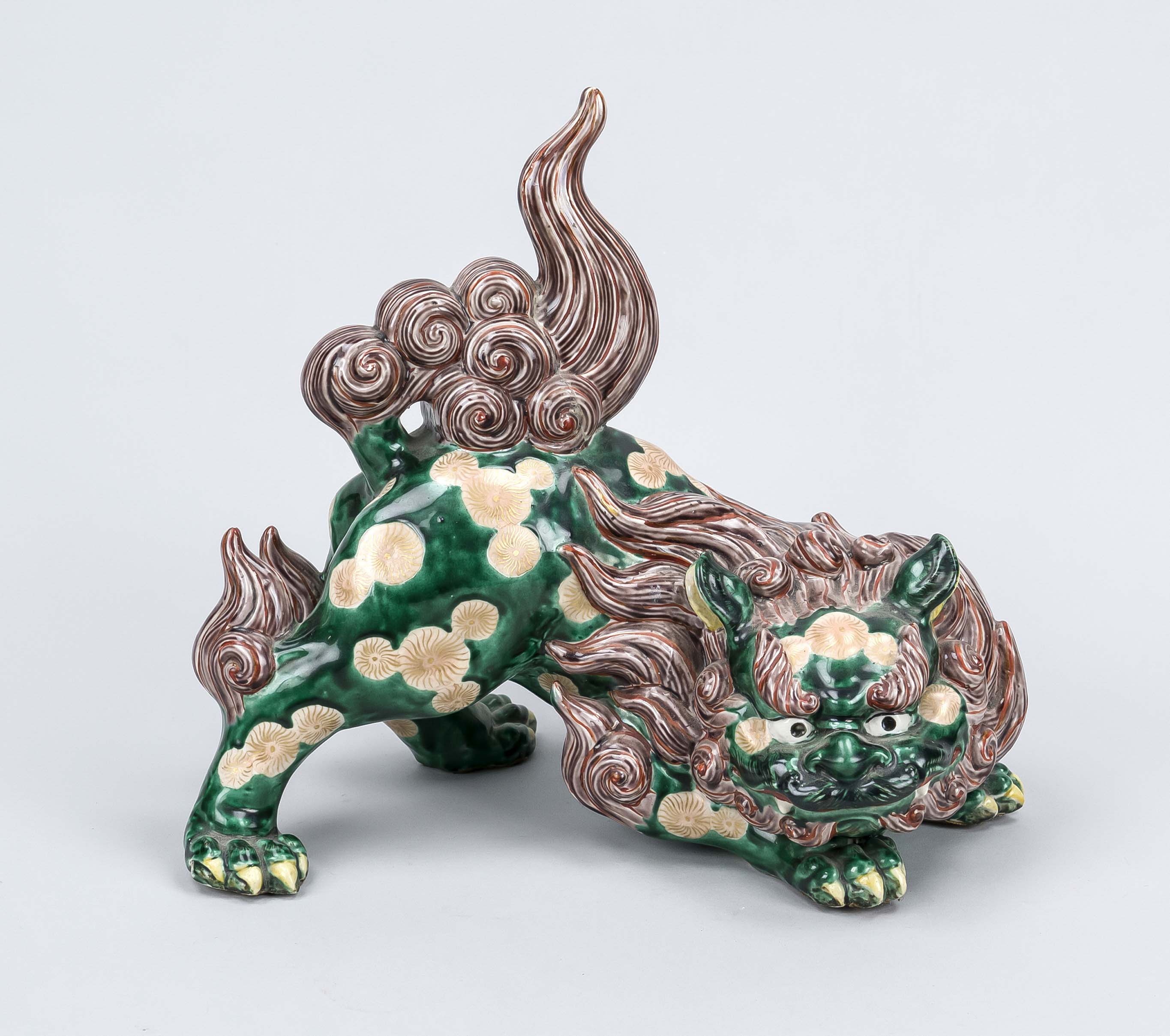 Large guardian lion, China, probably Republic period. Polychrome painted and glazed, glued tail,