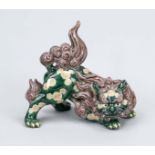 Large guardian lion, China, probably Republic period. Polychrome painted and glazed, glued tail,