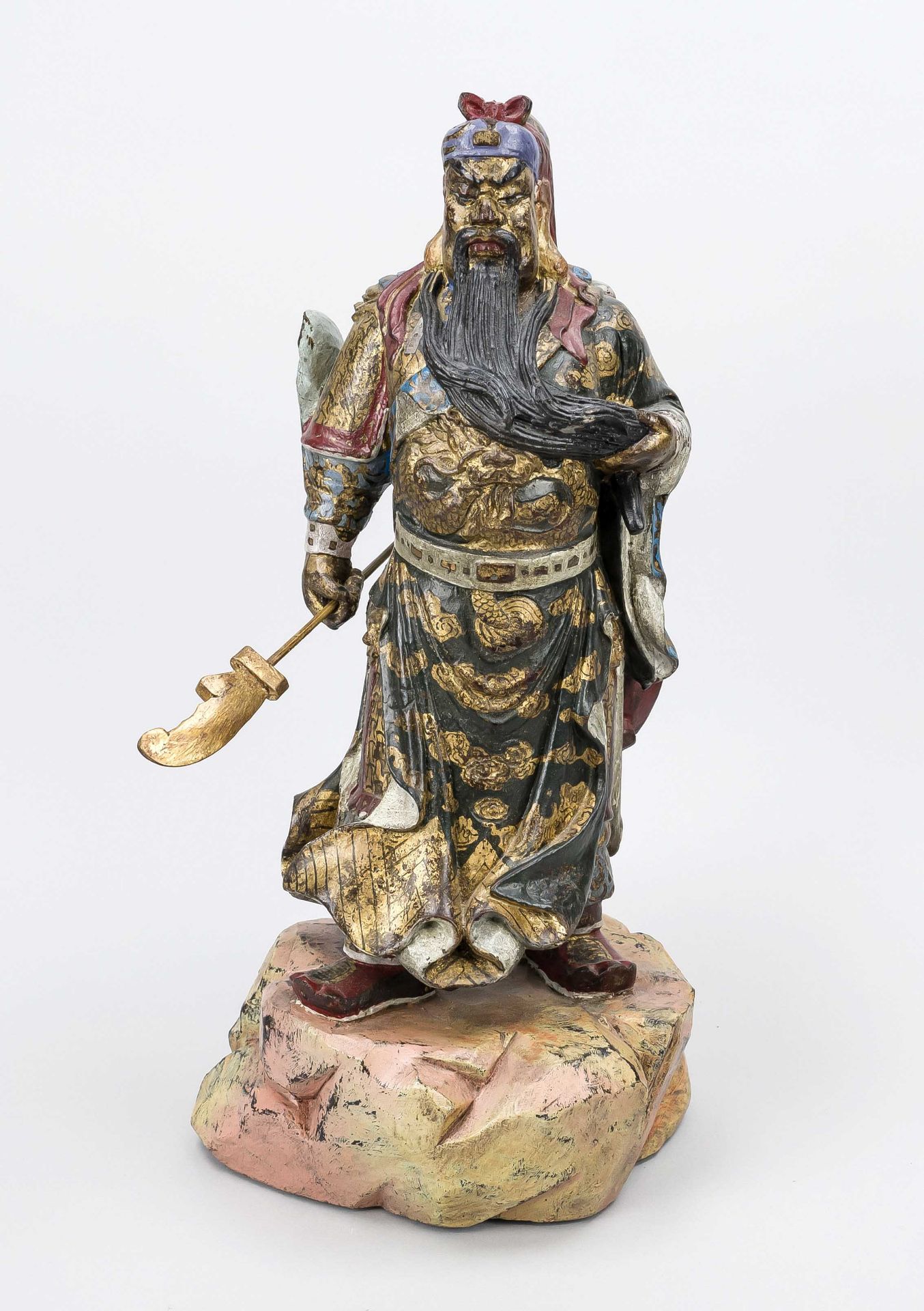 Warrior on rock, China, 20th century, wood polychrome and gold painted. Slightly rubbed & bumped, h.