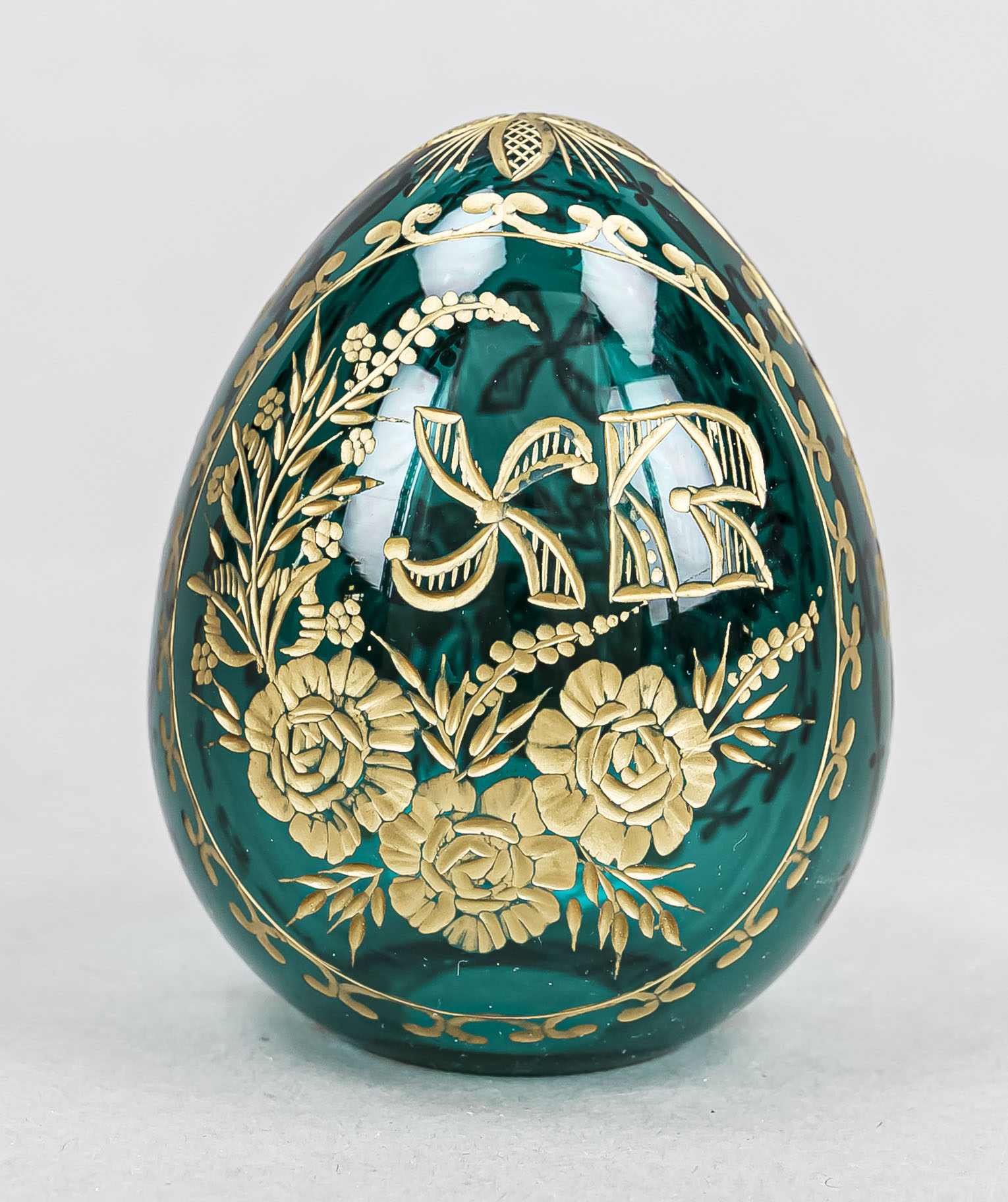 Ornament, 20th century, blue-green glass with floral engraved decoration and monogram, gold