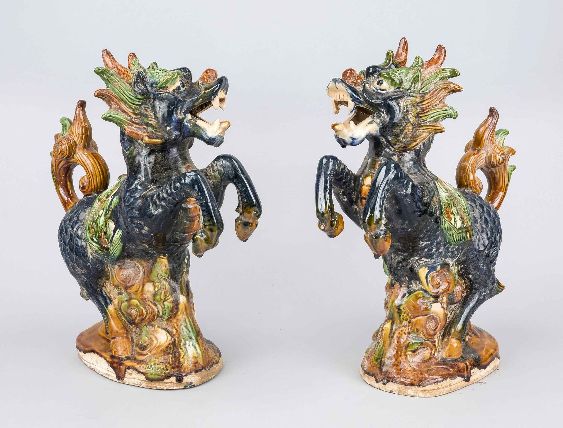 Pair of large guardian figures (dragon horses), China, probably Republic period. With a three-