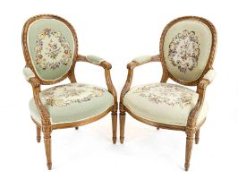 Pair of armchairs in Louis-Seize style, 20th century, beech, carved in typical style, floral