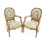 Pair of armchairs in Louis-Seize style, 20th century, beech, carved in typical style, floral